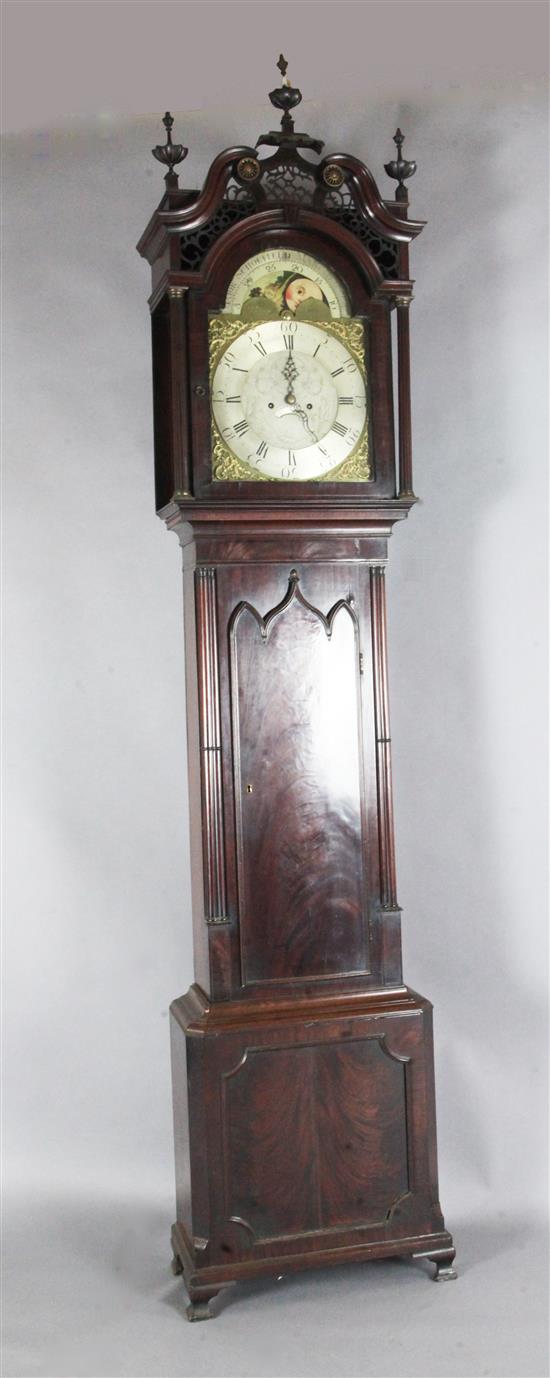 Major Scholfield of Manchester. An early 19th century flame mahogany cased eight day longcase clock, 8ft 6in.